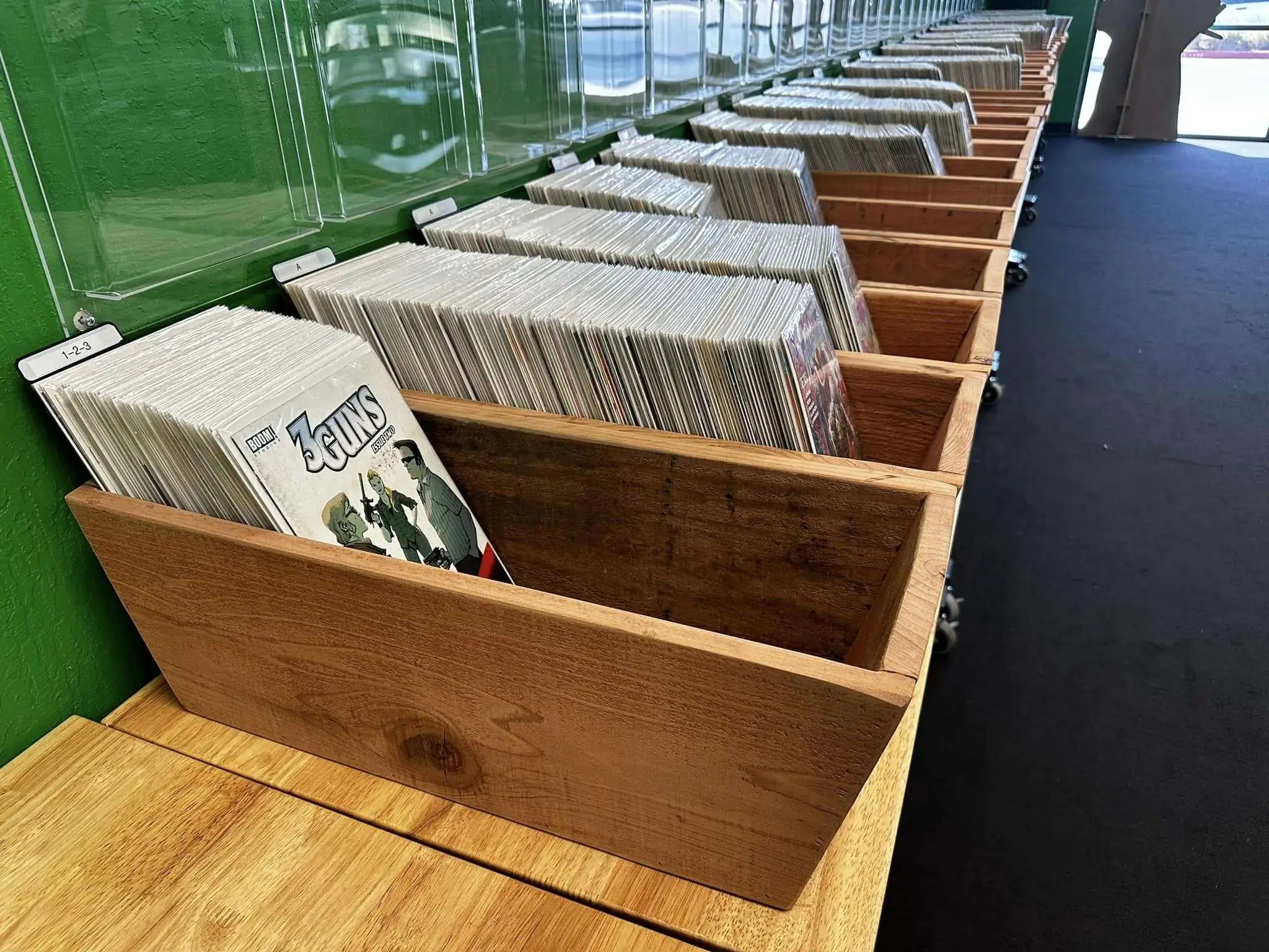 Custom display boxes and workflow setup at Big Mike's Comix
